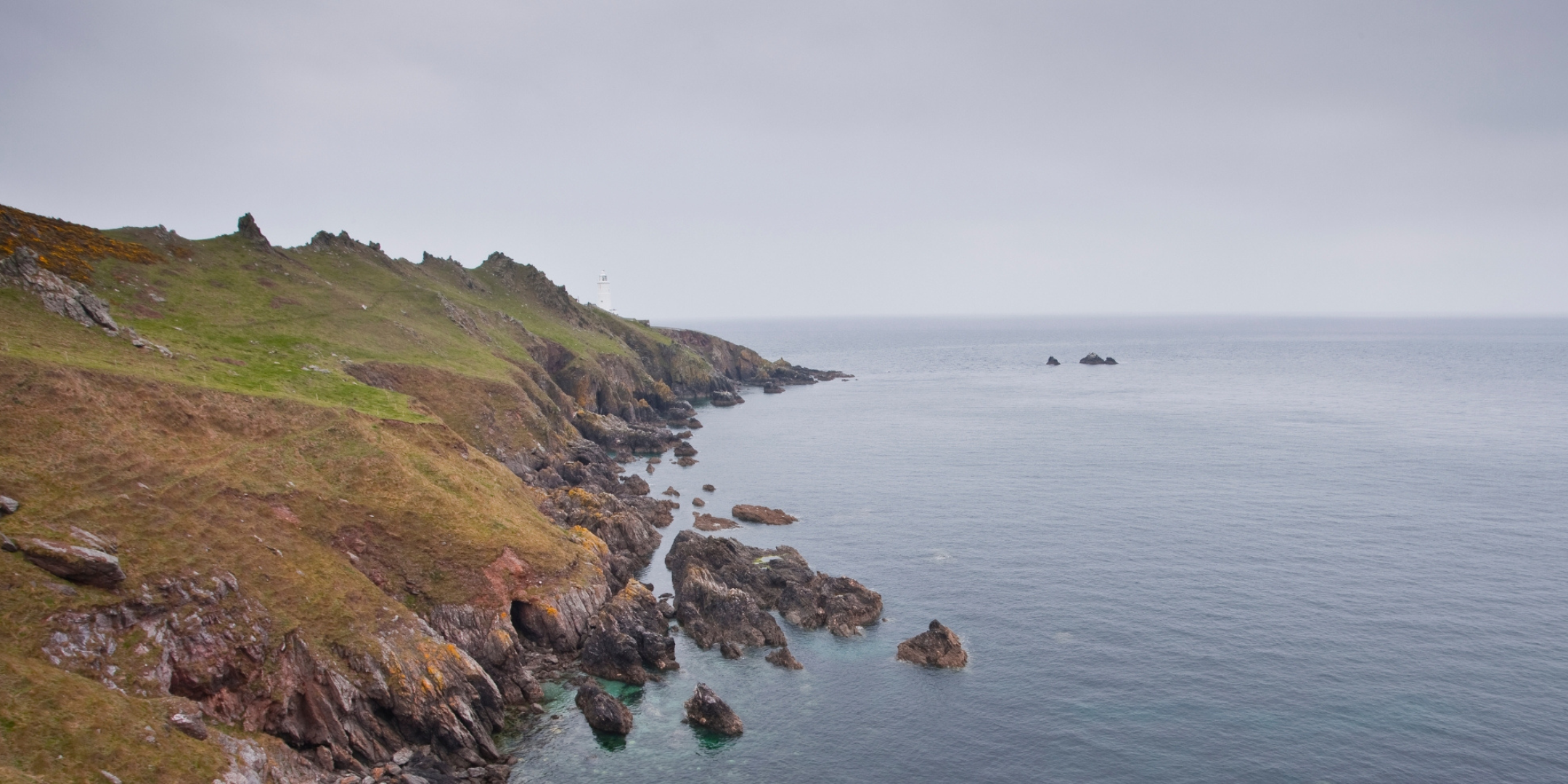 South Devon coastline and Start Point lighthouse landscape, reflecting the natural surroundings that inspire Helen Butler Designs jewellery