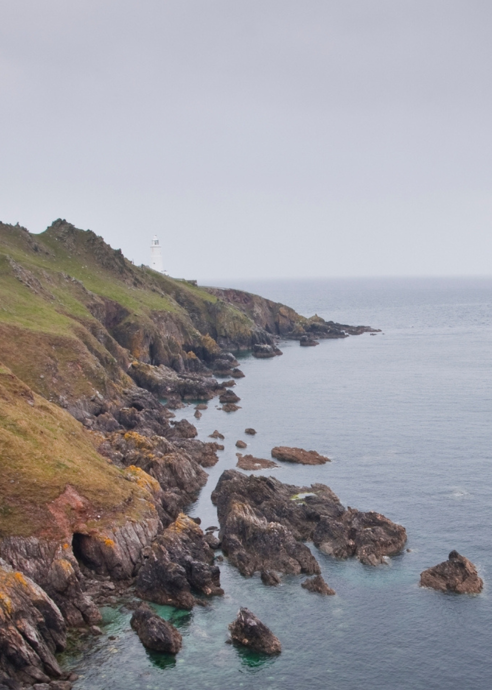 South Devon coastline and Start Point lighthouse landscape, reflecting the natural surroundings that inspire Helen Butler Designs jewellery